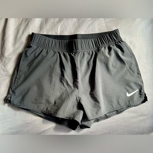 Black Nike shorts with inner tights